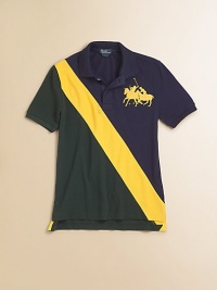 A banner stripe and embroidered pony add sporting heritage touches to the classic cotton polo.Ribbed polo collarShort sleevesButton-frontCottonMachine washImported Please note: Number of buttons may vary depending on size ordered. 