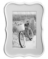 Shiny silver plate flows in graceful curves around the Crown Point picture frame, accenting a personal gallery with the modern polish of kate spade new york. Its white mat provides a crisp, clean contrast to any photo.