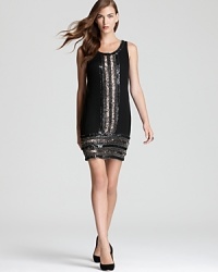 Adrianna Papell's sequin embellished dress lends downtown chic in a simple, sheath silhouette.