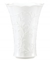 Featuring the embossed vine motif and shiny white glaze of the Opal Innocence Carved collection, this Lenox vase is designed to refine your home indefinitely. With a gently flared silhouette and scalloped edge. A beautiful wedding present!