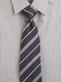 A handsome design expertly crafted in fine Italian silk.About 3 wideSilkDry cleanMade in Italy