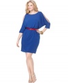 Calvin Klein infuses some color and style into your work wardrobe with this plus size dress. It easily wears from desk to dinner with its split sleeve look and contrasting patent belt. (Clearance)