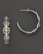 18K yellow gold and sterling silver blossoms form these pretty hoops from Konstantino.