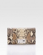 Exotic python skin adds sumptuous luxury to this slim flap bag finished with a detachable shoulder strap for versatility.Detachable shoulder strap, 20½ drop Buckle lock closure One outside pocket One inside open pocket Leather lining 9W X 6H X 1D Imported