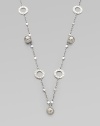 From the Dot Collection. This geometric design features a dotted texture stations, ball charms and multi-link chain in sleek sterling silver. Sterling silverLength, about 55Lobster clasp closureImported 