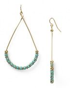 Give your look a hit of gypsy luxe with this pair of beaded teardrop hoop earrings from Vanessa Mooney. Crafted from gold plate with delicate beads, these earrings encapsulate breezy beauty.