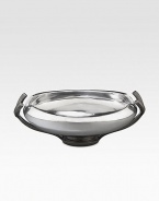 Crafted from stunning metal alloy, this lovely bowl artfully frames whatever you put in it with a gently curling lip, glossy shine and graceful pedestal base. From the Anvil Collection Iron-finish metal alloy 2-quart capacity 14¼W X 4H X 10D Hand wash Imported 