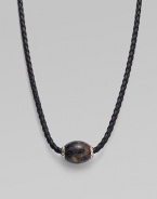 From the Ojime Collection. A contemporary look marries a marbled pietersite bead with a braided leather cord. Sterling silver accents Woven leather Length, 20 Width, about 3mm Chevron magnetic clasp Imported