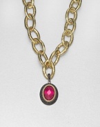 From the Laguna Collection. A pretty, faceted fuchsia quartz center set in 18k gold and sterling silver accented with three rows of rich black spinel. Fuchsia quartz18k goldSterling silverBlack spinelSize, about 1.33Black spinel accented baleImported Please note: Chain sold separately. 