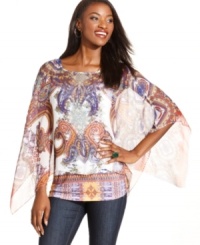 The contrast of a bold exotic print with sheer chiffon fabric is sure to make impression! Style&co.'s airy poncho comes with an accompanying camisole for a perfectly-matched look.