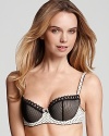 Ooh la la, a French-inspired push up bra with mesh overlay cups and fishnet print frame. Style #958157