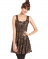 Let your star shine! BeBop's sleeveless skater dress features metallic lace fabric for party-ready style.