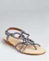 With cord and hardware details, these edgy Calvin Klein sandals lend downtown appeal to laid-back summer style.