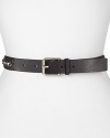 A bold all-around chain details this Cole Haan leather belt, styled to add a biker chic edge to a standard jeans and tee combination.