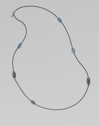 From the Cable Wrap Collection. A graceful design with faceted, marquis-shaped Hampton blue topaz stones wrapped and set in elegant, blackened sterling silver on a box link chain. Hampton blue topazBlackened sterling silverLength, about 38Lobster clasp closureImported 