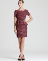 Trina Turk gets positively ladylike with this tweed peplum dress, rendered in a vibrant jewel tone palette.