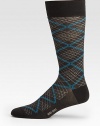 Modern argyle pattern is embroidered in a soft cotton blend with signature logo detail.Mid-calf heightPolyamide/cotton/modal/elastaneMachine washImported