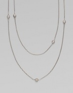 From the Petite Pavé Bead Collection. A long and graceful box-link chain of shining sterling silver, sprinkled with shimmering pavé diamond beads. Diamonds, 0.59 tcw Sterling silver Length, about 36 Lobster clasp Imported