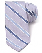 A fine blend of soft linen and plush silk harmonize together on this handsome tie, featuring a refreshing light stripe design that pairs perfectly with your warm weather suiting.