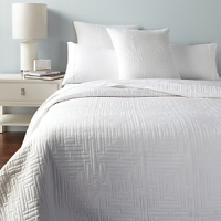 With clean lines and a geometric pattern, this decorative pillow heightens the contemporary-chic look of your room.