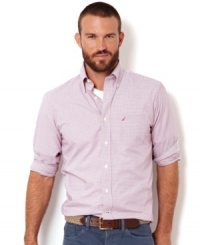 Change over your 'tude and not your shirt as you transition from work to after work play in this handsome plaid shirt by Nautica.