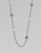 From the Midnight Pearl Collection. This lovely style features diamond accents, quatrefoils and lustrous pearl stations on a sleek, blackened sterling silver box chain. Blackened sterling silverWhite cultured South Sea pearlsDiamonds, .6 tcwLength, about 40Toggle closureImported 