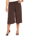 Enjoy the style and comfort of AGB's plus size palazzo pants, cinched by a belted waist.