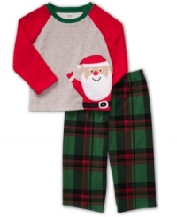 He'll be ready to rock around the Christmas tree when you present him with this Santa holiday pajama set from Carter's.