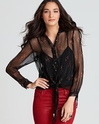 Exude chic allure with this Akiko sheer top finished in a pretty print. Pair with colored denim for on-trend style.