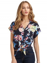 THE LOOKTropical floral printShirt collarDual welt pockets at chestButton-frontTie closure at waistBack zip closureTHE FITAbout 31 from shoulder to hemTHE MATERIALSilkCARE & ORIGINDry cleanImportedModel shown is 5'10 (177cm) wearing US size Small. 