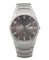 Innovative links seamlessly connect to the case of this sleek Skagen Denmark watch. Stainless steel bracelet and round case. Brushed gray dial features silver tone numerals and stick indices at markers, day and date window at three o'clock, logo at nine o'clock and three hands. Quartz movement. Water resistant to 30 meters. Limited lifetime warranty.