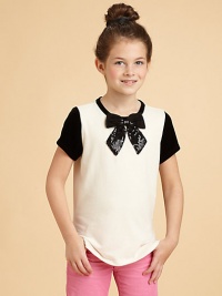 Her favorite live-in tee gets a shot of glamour from a big, soft sequined bow, front and center.Contrast band necklineShort contrast sleevesJuicy heart charm near hemCotton/modal/spandexMachine washImported