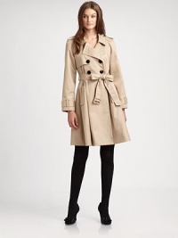 A cotton trenchcoat with feminine details and a waist-defining self-tie belt.Notched collarButton frontSelf-tie beltFully linedAbout 38 from shoulder to hemCottonDry cleanImported Model shown is 5'10 (177cm) wearing US size 4. 