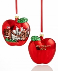 Take a bit of the Big Apple home this holiday with the New York City Christmas ornament. Featuring the Brooklyn Bridge and Manhattan skyline on one side and the date in glitter on the reverse.