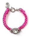 A bold take on this season's homespun trend, this fluoro woven bracelet from Juicy Couture is bright on.