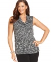 Broadcasting an embellished print, Alfani's sleeveless plus size top is a perfect partner for your neutral bottoms-- layer it with jackets and cardigans this season!