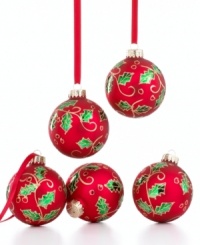 Trim your tree with jolly holly ornaments from Martha Stewart Collection for boughs of shimmer and cheer. With a matte red finish and gold glitter.