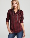 Under a blazer or with flare leg jeans, MICHAEL Michael Kors' bold blouse infuses your look with easy, elegant glamour.