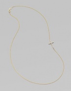 A wispy chain of 14k yellow gold features a cross pendant, encrusted in sparkling diamonds, set askew for a modern edge.Diamonds, .14 tcw 14k yellow gold Length, about 16 Pendant length, about ½ Spring ring clasp Made in USA