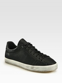 Trendy, downtown-inspired casual sneaker in perforated leather with contrast rubber sole.Leather upperLeather liningPadded insoleRubber soleImported