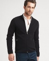 Extrafine wool shapes and defines this full-zip cardigan sweater that layers effortlessly over a classic woven shirt or a cotton tee.Two-way zip frontStand collarSide zip pocketsWoolDry cleanImported of Italian fabric