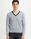 Sharp, contrast collar trim accents this smooth, fine-knit cotton pullover.V-neckRibbed cuffs and hemCottonMachine washImported