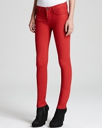 Flaunt a fierce look in fiery red HELMUT jeans, cut in a super-skinny silhouette for spray-on style. Seam detail at the knees lends a dose of modern edge.