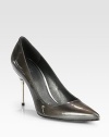 A metal heel upgrades this classic point toe silhouette of gleaming patent leather. Metal heel, 3¾ (95mm)Patent leather upperPoint toeLeather lining and solePadded insoleImported