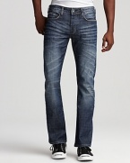 Artful distressing lends downtown cool to these slim bootcut jeans from Buffalo.