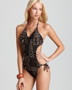 Take this season's exotic trend to the beach with this mud cloth-inspired monokini from Ralph Lauren Blue Label. This suit portrays far-flung cool with an armload of bangles and sandals.