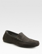 Sporty suede slip-on with stitch detail and an embossed logo.Suede upperRubber soleImported