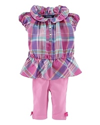 Sweet ruffles adorn a preppy madras tunic that is made complete with a matching legging for the perfect set.