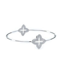 The clover-shaped stations on this delicate bangle from Crislu strike a distinctive balance between classic iconography and contemporary sparkle.