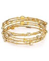 The Seasonal Whispers girl loves to stack the brand's beautifully eclectic bracelets. This set is studded with Swarovski crystal stations and gold tone inserts, creating a cool textured statement.